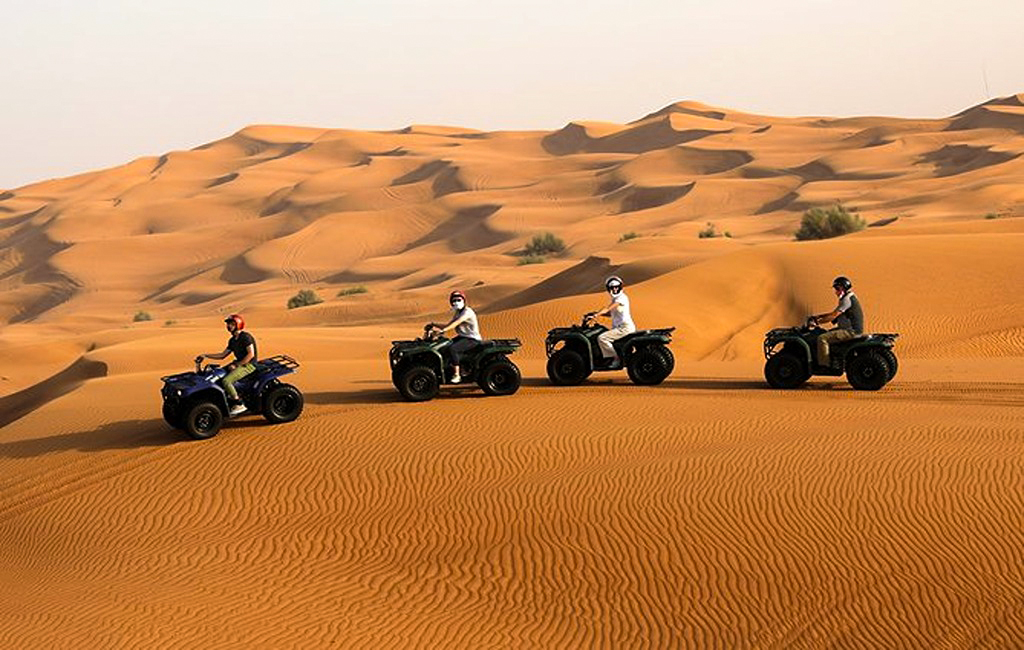 Open Desert Quad Biking at Red Dunes Dubai Desert